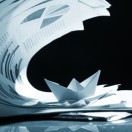 Business-concept-paper-boat-a-13488875-bigstock-smaller